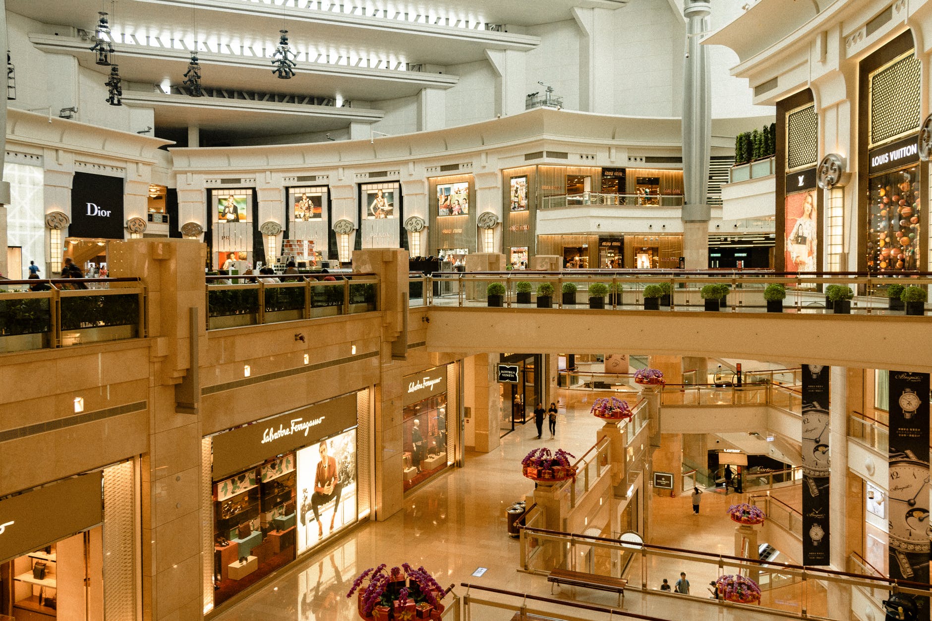 modern style shopping center with shiny floor and many boutiques